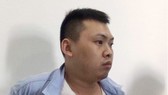 Đối tượng Xiao Qui Ping tại cơ quan công an. Ảnh: CA cung cấp