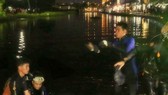 Đã tìm thấy thi thể người phụ nữ lao xe xuống hồ do triều cường dâng cao