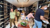 Đột kích các “tổng kho” thực phẩm chức năng, đồ hiệu thời trang giả
