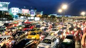 Traffic jam in Truong Son-Hong Ha street, Tan Binh district, HCMC (Photo: SGGP)