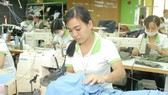 Workers at Phuong Dong garment firm (Photo: SGGP)