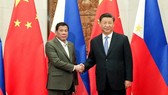 President Duterte (left) and Chinese President Xi Jinping shake hands at the start of their bilateral meeting at the Diaoyutai State Guesthouse in Beijing on August 30 (Source: philstar.com)