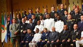 Deputy Commander of the Vietnam Coast Guard Major General Bui Trung Dung (first row, first from left) poses for a group photo (Photo: VNA)