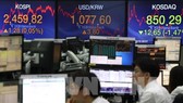 Chứng khoán châu Á diễn biến trái chiều. Ảnh minh họa: Yonhap/ TTXVN