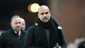 HLV Pep Guardiola quyết cùng Man.City quay trở lại thách thức ở mùa giải tới. Ảnh: Getty Images