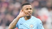 Gabriel Jesus và động tác ăn mừng bàn thắng quen thuộc. Ảnh: Getty Images