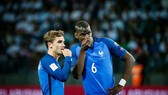Antoine Griezmann (trái) là thương vụ cần phải thành công với Man.United. Ảnh: Getty Images