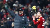 HLV Jurgen Klopp thừa nhận hạnh phúc với màn khởi đầu khó tin. Ảnh: Getty Images
