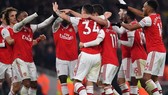 Đám đông cầu thủ Arsenal ăn mừng là hình ảnh cho thấy sự gắn kết đã trở lại. Ảnh: Getty Images