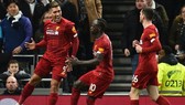 Roberto Firmino mừng bàn thắng đưa Liverpool đến gần thêm với chức vô địch. Ảnh: Getty Images
