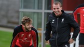 Adam Lallana và HLV Brendan Rodgers hợp tác ngắn ngủi ở Liverpool. Ảnh: Getty Images