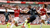 Man.City - Arsenal sẽ là trận cầu hâm nóng cho ngày trở lại. Ảnh: Getty Images