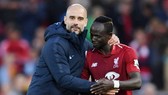 HLV Pep Guardiola khẳng định Liverpool xứng đáng để được tôn vinh. Ảnh: Getty Images