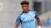 HLV Pep Guardiola tuyên bố không sẵn sàng đón lại những ai từng quyết rời bỏ CLB như Jadon Sancho. Ảnh: Getty Images