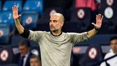 Pep Guardiola thận trọng nhắc nhở cầu thủ rằng nhiệm vụ mùa giải vẫn chưa hoàn thành. Ảnh: Getty Images