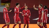 Liverpool quá mạnh để qua đó có đồng điểm với Tottenham ở ngôi đầu Premier League. Ảnh: Getty Images