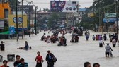 Cảnh ngập lụt sau mưa lớn kéo dài tại Bago, Myanmar ngày 28-7. Ảnh: EPA