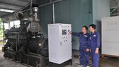 Máy phát điện sử dụng khí chuyển hóa từ rác tại bãi rác Gò Cát Ảnh: THÀNH TRÍ