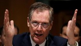Đại diện Thương mại Mỹ Robert Lighthizer nói việc Mỹ đánh thuế lên hàng các nước là phù hợp các thỏa thuận quốc tế. Ảnh: REUTERS
