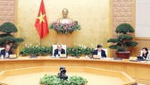 Thủ tướng Nguyễn Xuân Phúc chủ trì phiên họp Thường trực Chính phủ về giải pháp bình ổn giá thịt heo. Ảnh: TTXVN
