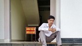 Ông Lương Hữu Phước ngồi trước TAND tỉnh Bình Phước