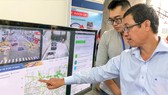 Doanh nghiệp giới thiệu bản đồ số giao thông. Ảnh: TẤN BA