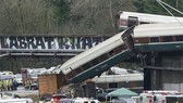 The scene of a portion of the Interstate I-5 highway after an Amtrak high speed train derailled from an overpass early Monday near the city of Tacoma, Washington state