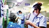 Hoạt động sản xuất tại một doanh nghiệp FDI Nhật Bản. Ảnh: QUANG PHÚC