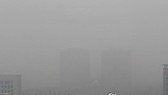 Thành phố Seoul khuất trong màn bụi. Ảnh: Yonhap