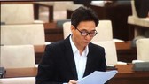 Phó Thủ tướng Vũ Đức Đam trình bày báo cáo tại phiên khai mạc phiên họp thứ 43 của UBTVQH