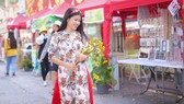 Người đẹp điền kinh Lê Thị Mộng Tuyền thướt tha trong tà áo dài truyền thống du xuân