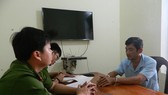 Ông Tính tại cơ quan công an