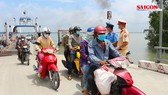 TPHCM tăng cường tuyên truyền phòng chống dịch Covid-19 ở bến phà