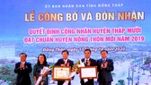 Quang cảnh lễ công bố huyện Tháp Mười đạt chuẩn nông thôn mới năm 2019