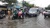Nhiều khu vực trên địa bàn TPHCM bị ngập nước sau mỗi trận mưa lớn. Ảnh: ĐAN NGUYÊN