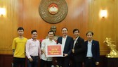 Văn Toàn tại Ủy ban Trung ương Mặt trận Tổ quốc Việt Nam ngày 22-3. Ảnh: MTTQVN
