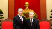 eneral Secretary of the Communist Party of Vietnam Nguyen Phu Trong (R) receives Chinese State Councillor and Foreign Minister Wang Yi in Hanoi on April 2 (Photo: VNA)