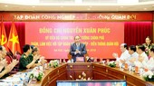 Prime Minister Nguyen Xuan Phuc delivered a speech at the working session with Viettel Group. Photo by VGP