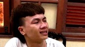 Kha cries at police station (Photo: SGGP)