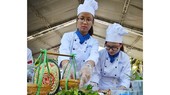 Young cooks are displaying their dishes in a tourism festival in Ho Chi Minh City