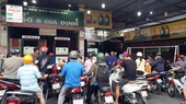 Panic buying causes queues in HCMC petrol stations