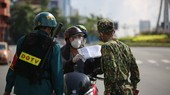 Military officers on first day of tighter social distancing order in HCMC