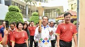SEA Games torch paraded through Hanoi’s streets