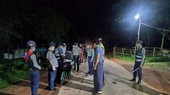 Police check a motorcycle in Yangon, Myanmar on 3 September after a curfew was imposed to prevent the spread of COVID-19. (Photo: gnlm.com.mm)