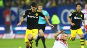 Dortmund (trái) sẽ phải nỗ lực nhiều hơn nữa thì mới có thể giành được chiến thắng trước Gladbach. Ảnh: Getty Images