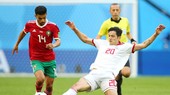 Morocco (trái) đã hứng chịu thất bại cay đắng trong một diễn biến mà họ đã chơi tốt hơn so với Iran. Ảnh: Getty Images
