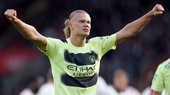 HLV Pep Guardiola tin Erling Haaland có thể cạnh tranh với kỷ lục ghi bàn của Lionel Messi và Cristiano Ronaldo.