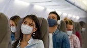 WHO khuyến cáo đeo khẩu trang trên máy bay đường dài