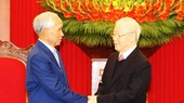 Tổng Bí thư Nguyễn Phú Trọng tiếp đồng chí Khamphan Pheuyavong vào ngày 13-12. Ảnh: TTXVN