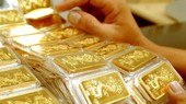 Giá vàng thế giới giảm mạnh, giá vàng trong nước giảm cầm chừng